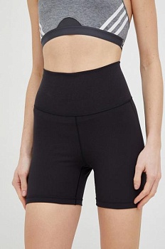 foto шорти для йоги adidas performance yoga studio жіночі колір чорний однотонні висока посадка